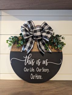 this is us our life our story our home wood sign with greenery and bow