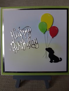 a birthday card with balloons and a dog on the front that says, happy birthday