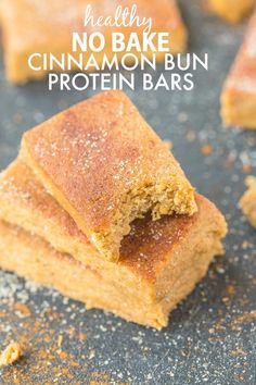 healthy no bake cinnamon bun protein bars on a baking sheet with text overlay