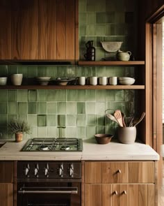 Playful 70s kitchen with colorful small appliances Use Of Space In Interior Design, Unique House Remodel Ideas, 70s Kitchen Inspiration, Green Midcentury Modern Kitchen, Kitchen Green Ideas, 1970s Inspired Kitchen, 70s Kitchen Design, Green Backsplash Wood Cabinets, 70s Kitchen Renovation