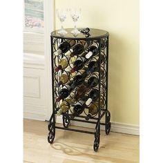 a wine rack with several bottles and glasses on it