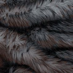 an animal fur texture is shown in black and grey colors, as well as the background