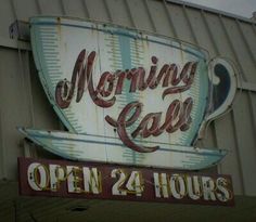 a sign for a coffee shop that says morning cafe open 24 hours