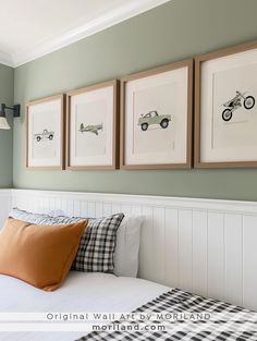 A stylish toddler boy's room featuring a truck and car-themed nursery design with minimalist décor. The room includes vehicle-inspired art prints, a brown Labrador dog, and a soft pale blue wall color. Perfect ideas for a cool boy's bedroom, with a focus on vehicles and fun, youthful details. Ideal for a young boy’s nursery or toddler bedroom, blending modern design with playful elements. Blue Wall Nursery, Transportation Toddler Room, Little Boys Bedroom Ideas, Bedroom Ideas Brown, Boys Car Bedroom, Nursery Boy Room, Boy Room Design, Boy Car Room