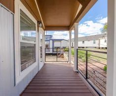 a long covered porch leading to two houses