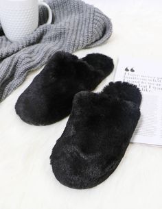 Closed toe faux fur fuzzy wuzzy slippers on white background Super Soft Comfy Slippers With Round Toe, Comfy Super Soft Round Toe Slippers, Cozy Soft Synthetic Slippers, Cozy Black Slippers For Indoor Use, Cozy Black Indoor Slippers, Super Soft Slip-on Comfy Slippers, Super Soft Slip-on Synthetic Slippers, Super Soft Synthetic Slip-on Slippers, Comfy Slip-on Super Soft Slippers