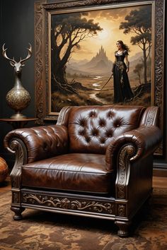 a brown leather chair sitting in front of a painting