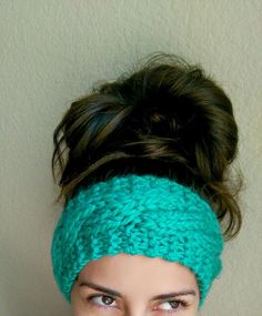 a close up of a woman wearing a headband