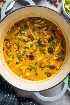 a large pot filled with soup and vegetables