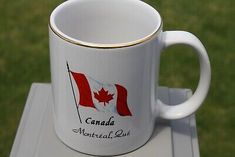 a coffee cup with the canadian flag on it