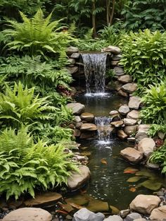 a small waterfall in the middle of a garden with rocks and plants around it, surrounded by greenery