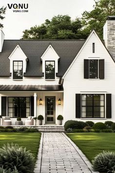 A charming cottage-style home exterior with a classic black and white color scheme, elegant shutters, and a welcoming front porch. The design blends traditional and modern elements for a timeless look. Modern House With Front Porch, Black And White Front Porch Ideas, Front Windows Exterior, Modern Traditional House Exterior, House Exterior Classic, White And Black House Exterior, Traditional House Exterior, Cottage Style Homes Exterior, House Styles Exterior