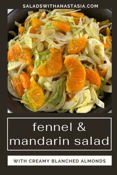 fennel and mandarin salad with creamy shaved almonds in a black bowl on a table