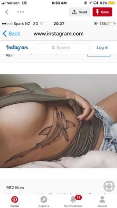 the back of a woman's stomach with birds on it and an instagram