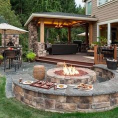 a fire pit in the middle of a patio