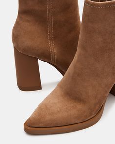 Introducing our HARDEN ankle bootie. Expertly crafted with a pointed toe, this bootie offers a sleek and stylish look. The block heel provides comfortable support for all-day wear, while the inside zipper allows for easy on and off. Step out in style with these must-have booties. 3.75 inch heel height Size 6 measurements: 10 inch shaft circumference, 5 inch shaft height Size 8 measurements: 10.75 inch shaft circumference, 5.25 inch shaft height Size 10 measurements: 11.5 inch shaft circumference, 5.5 inch shaft height Suede upper material Textile and synthetic lining Synthetic sock Synthetic sole Imported 2023 Wardrobe, Women's Booties, Wardrobe Ideas, Fall 2023, Ankle Bootie, Fashion Story, Womens Boots Ankle, Platform Boots, The Block