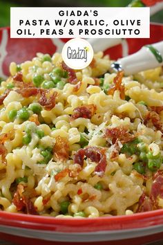 pasta with peas and prosciutto in a red bowl on top of a table