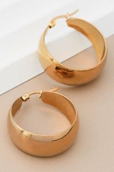 18K Gold Dipped Non-Tarnish Stainless Steel Hoop Earrings. These are hypoallergenic, waterproof, fade-resistant, and tarnish-free, ensuring their beauty lasts for years. With proper care, the gold plating will remain radiant for at least 2 years. Approx. 1.2" L Perfect Jeans, Boutique Homes, Gold Dipped, 18k Gold, Gold Plate, Hoop Earrings, Plating, Gift Card, Gold