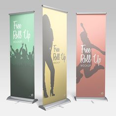 three roll up banners with the silhouette of a woman on one side and an image of a skateboarder on the other