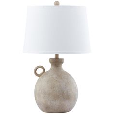 a table lamp with a white shade on the base and a light bulb attached to it