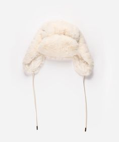 Stay warm and chic with our Faux Fur Trapper Hat, the ultimate accessory for your Winter Resort Collection wardrobe. Designed to combine functionality with luxury, this hat features plush, high-quality faux fur for unmatched coziness and a sophisticated touch. The classic trapper silhouette, complete with tie-able faux leather drawstrings ensures a snug fit against brisk winter winds. Perfect for snowy escapes or stylish strolls in the cold, this hat elevates any winter outfit while keeping you Men Hats Styles, Fur Trapper Hat, Fur Trapper, Winter Resort, Trapper Hat, Trapper Hats, Western Hats, Fur Hat, Resort Collection