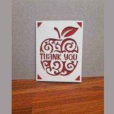 an apple shaped thank you card with the words,'thank you'on it