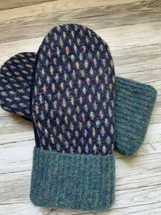 Upcycled wool sweater mittens. These cozy mittens are perfect for cold winter days. This pair is made from three different sweaters I washed in hot water to felt.  The inside is lined with cozy warm fleece.  This pair would fit most women's  hands. Measurement are 9.5 inches top to bottom and 4.5 inches wide.  Each pair is a one of a kind creation  Hand wash and lay flat to dry Looking for a certain color?  Send me a note and I will create a pair for you! These adorable mittens are made using do Felted Sweater Mittens, Sweater Mittens, Wool Mittens, Felted Wool, Winter Days, Winter Day, Pattern Download, Mitten Gloves, Wool Sweater