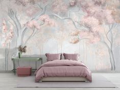 a bedroom scene with a bed, table and wall mural in pastel pink tones