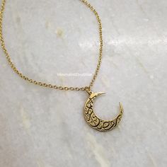 18K Gold Calligraphic Written on Moon Islamic Necklace, Engraving Moon Necklace, Arabic Necklace, Moon Necklace Gold, Minimal Moon Jewelry Details:- Length: 17 inches + Extender  Material: 18k gold plated, Brass Care:- When not wearing, please keep in a sealed plastic bag Packaging: All our pieces comes in a gift box bag so your item is ready to be gifted If you have any question feel free to contact us via Etsy message Happy Shopping Moon Shaped Necklace With Moon Print For Gift, Engraved Moon-shaped Brass Necklace, Engraved Moon Shaped Brass Necklace, Engraved Brass Moon Necklace, Moon Print Necklace Perfect For Gifts, Moon Print Moon Shaped Necklace For Gift, Moon Print Moon-shaped Necklace Gift, Moon Print Moon Shaped Necklace Gift, Half Moon Jewelry With Moon Print For Gift