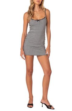 Cheerful gingham checks enliven this rickrack-trimmed dress designed in a leggy length. Hidden back-zip closure Scoop neck Adjustable straps 95% polyester, 5% spandex Machine wash, dry flat Imported Gingham Plaid Mini Dress, Fitted Gingham Mini Dress With Square Neck, Fitted Gingham Plaid Mini Dress, Gingham Mini Dress With Houndstooth Pattern, Fitted Gingham Mini Dress For Picnic, Fitted Gingham Mini Dress For Picnics, Fitted Mini-length Plaid Dress For Picnic, Spring Houndstooth Mini Dress, Spring Houndstooth Plaid Mini Dress