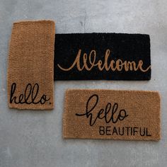 three door mats with the words welcome and hello beautiful on them