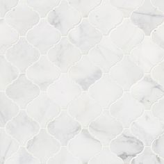 a white marble tile with wavy lines