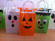 halloween bags with faces and noses on them