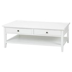 a white coffee table with two drawers