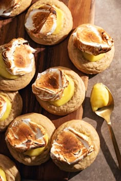 baked goods displayed on wooden cutting board with spoon