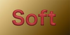 the word soft is written in red and gold letters on a golden background with an orange rectangle