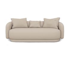 a beige couch with four pillows on the back and one arm folded up to show it's shape