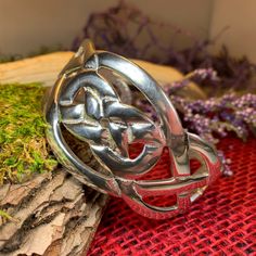 TAKE AN ADDITIONAL 20% OFF THE ALREADY REDUCED SALE PRICE - ADDITIONAL 20% IS DEDUCTED AT CHECKOUT with code SAVE20 Stunning! Our Pewter Celtic Knot Bangle Bracelet features an ancient Celtic design that goes back thousands of years, embraced on both sides by a Celtic knot pattern. Made of heavy, solid pewter that will never tarnish and designed to last a lifetime. A beautiful gift! Bracelet is in the cuff style with an open back and can be adjusted for almost any wrist size. A rich, traditional Knot Pattern, Knot Bangle, Gift Sister, Gift Bracelet, Scarf Rings, Celtic Design, Irish Jewelry, Gift Girlfriend, Tree Of Life Necklace