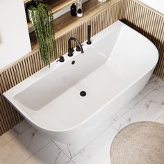 a large white bath tub sitting on top of a bathroom floor