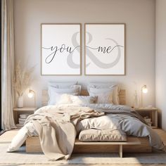 two posters on the wall above a bed in a bedroom with white sheets and pillows