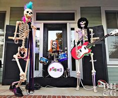 three skeletons are standing in front of a house with guitars and drums on the porch