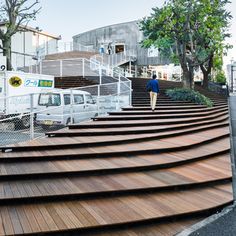 several large wooden steps on the side of a building