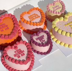 Various sized heart shaped vintage birthday cakes with colorful orange and pink icing Birthday Cake Background, 29th Birthday Cakes, 23 Birthday Cake, Vintage Birthday Cake, 24th Birthday Cake, Colorful Birthday Cake, Cake Background