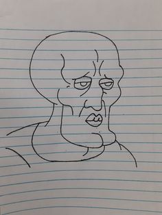 a drawing of a man's face on lined paper