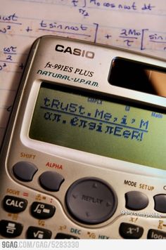 a calculator sitting on top of a piece of paper