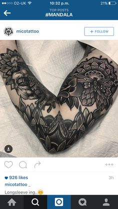 a woman's arm with flowers on it