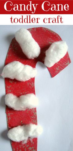 a candy cane made out of toilet paper with the words candy cane toddler craft on it