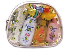 a white bag filled with lots of different types of toothbrushes and shampoos