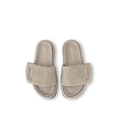 LOUIS VUITTON® - Pool Pillow Flat Comfort Mule - Beige Louis Vuitton Slides, Pool Pillow, Luxury Slippers, Louis Vuitton Gifts, Shoe Wishlist, Trunk Bag, Leather Label, Wallet Pouch, Monogram Bag