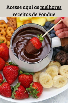 chocolate fondant with strawberries, bananas and pretzels on a white plate